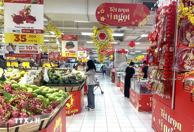 Chương tr&igrave;nh khuyến mại dịp Tết tại si&ecirc;u thị Go!. (Ảnh: TTXVN)