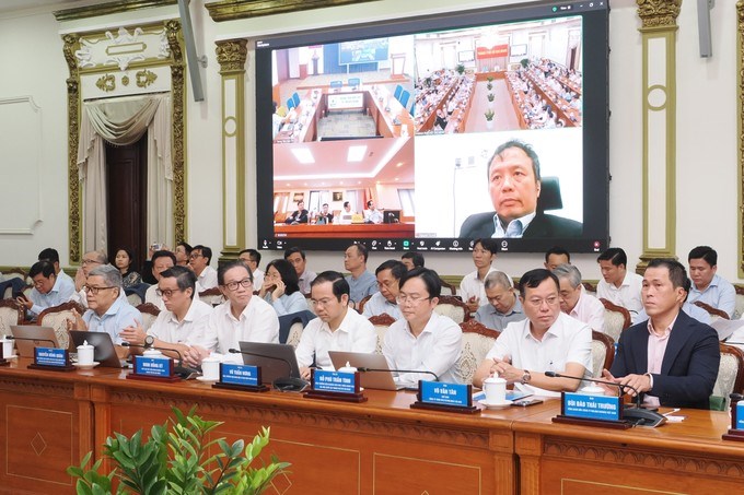 Các đại biểu tham dự hội thảo tại trụ sở UBND TPHCM. Ảnh: HOÀNG HÙNG