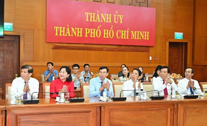 Các đại biểu dự lễ trao quyết định cán bộ. (Ảnh: SGGP)
