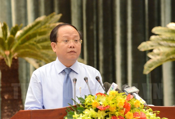Phó Bí thư Thường trực Thành ủy TPHCM Tất Thành Cang phát biểu chào mừng hội thảo. (Ảnh: Long Hồ)