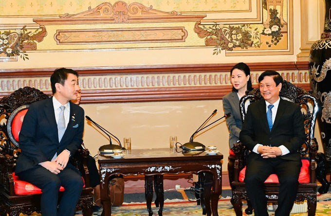 Đồng chí Võ Văn Minh tiếp ông Sasaki Hajime. (Ảnh SGGP)