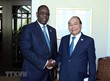 Thủ tướng Nguyễn Xuân Phúc gặp Tổng thống Senegal Macky Sall. (Ảnh: TTXVN)