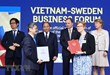 Thủ tướng Nguyễn Xuân Phúc và Thủ tướng Thụy Điển Stefan Löfven chứng kiến Lễ trao Biên bản thỏa thuận hợp tác giữa hai nước. (Ảnh: TTXVN)