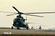 10 chiếc trực thăng Mi-8, Mi-17 và Mi-171 sẵn sàng cất cánh bay lên bầu trời Thành phố Hồ Chí Minh, thực hiện nhiệm vụ bay chào mừng 50 năm Giải phóng miền Nam, thống nhất đất nước. (Ảnh: TTXVN)