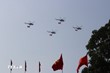 Mở đầu cuộc diễu binh, diễu hành là các biên đội của Không quân nhân dân Việt Nam anh hùng bay trên bầu trời Tổ quốc. (Ảnh: TTXVN)
