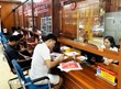 Trung tâm hành chính công xã Vị Xuyên (Tuyên Quang) nhộn nhịp ngày làm việc đầu tiên. (Ảnh: TTXVN)