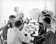 Chủ tịch Hồ Chí Minh đến thăm và cùng ăn cơm trên tàu với cán bộ, chiến sĩ bộ đội hải quân bảo vệ bờ biển Quảng Ninh (1965). (Ảnh: TTXVN)